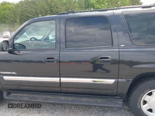 2004 GMC Yukon XL SLE with VIN 3GKEC16Z54G100304, listed as a IAAI auction lot 42101730 with 192,891 mi miles. Bid and sale history available at carsss.com. Image 14.