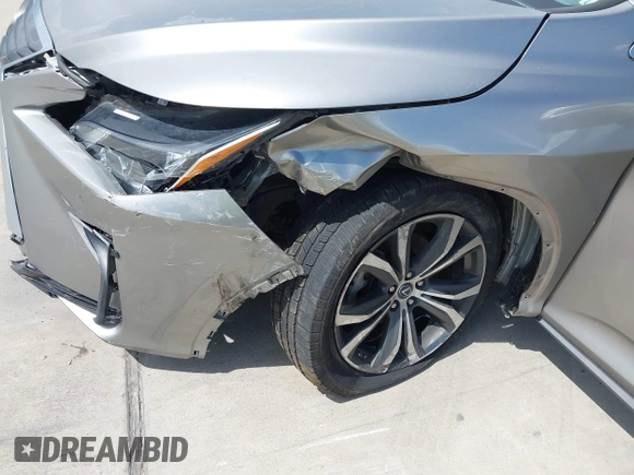 2018 Lexus RX 350 z VIN 2T2ZZMCAXJC110162, wystawiony jako IAAI lot #42608568 z przebiegiem 70 231 mil mil oraz . Historia ofert i sprzedaży dostępna na DreamBid. Obrazek 6.