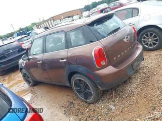 2016 MINI Countryman z VIN WMWZB3C50GWR47537, wystawiony jako IAAI lot #42242795 z przebiegiem 46 960 mil mil oraz . Historia ofert i sprzedaży dostępna na DreamBid. Obrazek 14.
