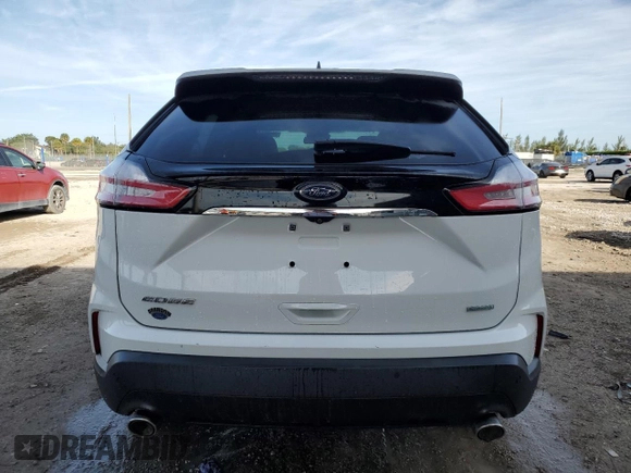 2020 Ford Edge SE z VIN 2FMPK3G98LBB42724, wystawiony jako Copart lot #49602455 z przebiegiem Nie podano mil oraz Nie do naprawy • Non repairable. Historia ofert i sprzedaży dostępna na DreamBid. Obrazek 6.