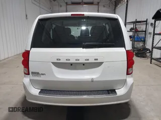 2016 Dodge Grand Caravan SE with VIN 2C4RDGBG1GR392484, listed as a IAAI auction lot 41663549 with 126,882 mi miles and . Bid and sale history available at DreamBid. Image 16.