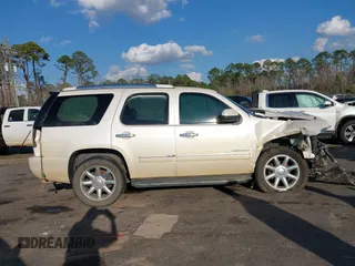 2013 GMC Yukon Denali with VIN 1GKS1EEF6DR278035, listed as a IAAI auction lot 41526763 with 149,815 mi miles. Bid and sale history available at carsss.com. Image 13.