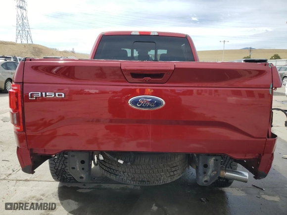 2015 Ford F-150 XLT w/HD Payload Pkg with VIN 1FTFW1EG1FKE40407, listed as a Copart auction lot 49809255 with 130,799 mi miles and Salvage Title. Bid and sale history available at carsss.com. Image 6.