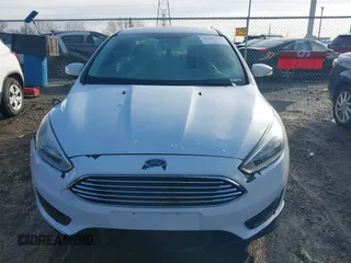 2016 Ford Focus SE with VIN 1FADP3F28GL348103, listed as a IAAI auction lot 41185718 with 69,256 mi miles. Bid and sale history available at carsss.com. Image 12.