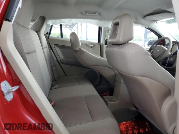 2009 Dodge Caliber SXT z VIN 1B3HB48A29D156808, wystawiony jako Copart lot #52732095 z przebiegiem 99 613 mil mil oraz Szkoda całkowita • Salvage title. Historia ofert i sprzedaży dostępna na DreamBid. Obrazek 11.