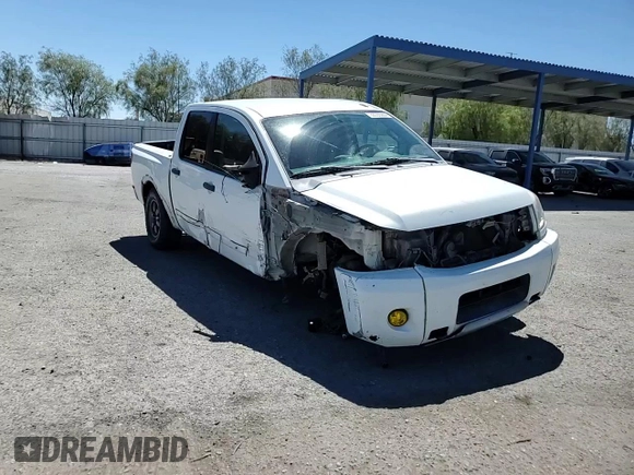 2015 Nissan Titan Pro-4X z VIN 1N6AA0EC9FN512658, wystawiony jako Copart lot #68066964 z przebiegiem 131 026 mil mil oraz Szkoda całkowita • Salvage title. Historia ofert i sprzedaży dostępna na DreamBid. Obrazek 11.