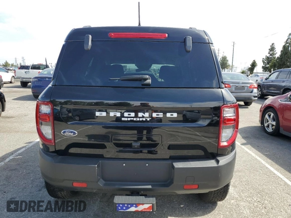 2023 Ford Bronco Sport Badlands z VIN 3FMCR9D97PRD35830, wystawiony jako Copart lot #56950865 z przebiegiem 7 401 mil mil oraz Szkoda całkowita • Salvage title. Historia ofert i sprzedaży dostępna na DreamBid. Obrazek 6.