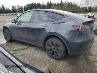 2025 Tesla Model Y Long Range with VIN 7SAYGDEE5SF296652, listed as a Copart auction lot 46664465 with 452 mi miles and Salvage Title. Bid and sale history available at DreamBid. Image 2.