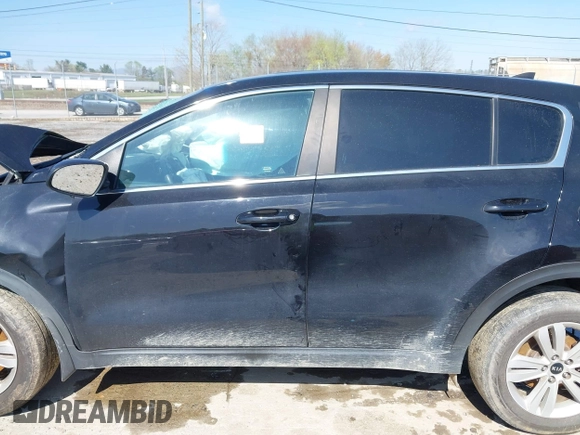 2019 Kia Sportage LX with VIN KNDPM3AC4K7621023, listed as a IAAI auction lot 41981361 with Not Provided miles and . Bid and sale history available at DreamBid. Image 14.