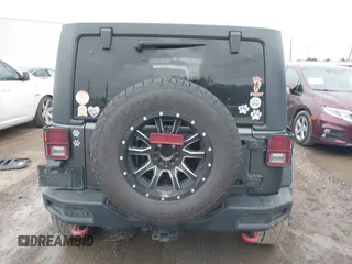 2018 Jeep Wrangler Unlimited Rubicon Recon with VIN 1C4BJWFG4JL827920, listed as a IAAI auction lot 41368319 with 110,835 mi miles and . Bid and sale history available at DreamBid. Image 17.