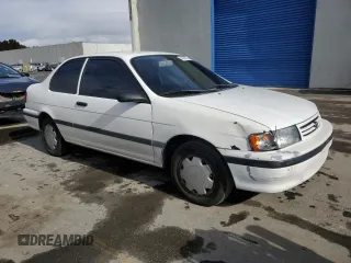 1992 Toyota Tercel z VIN JT2EL43B0N0152801, wystawiony jako Copart lot #43838825 z przebiegiem 81 697 mil mil oraz Tytuł czysty. Historia ofert i sprzedaży dostępna na DreamBid. Obrazek 4.