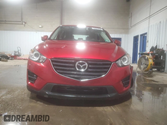 2016 Mazda CX-5 Sport with VIN JM3KE4BY4G0844967, listed as a Copart auction lot 54829885 with 95,653 mi miles and Salvage title. Bid and sale history available at DreamBid. Image 5.