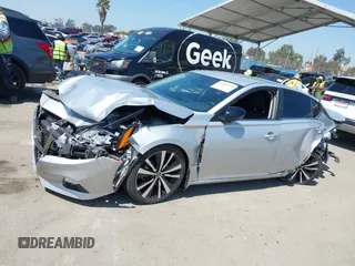 2022 Nissan Altima SR with VIN 1N4BL4CV5NN340131, listed as a IAAI auction lot 42002494 with 12,311 mi miles and . Bid and sale history available at DreamBid. Image 14.