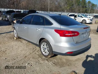 2016 Ford Focus SE with VIN 1FADP3F27GL390830, listed as a IAAI auction lot 41665012 with 119,673 mi miles. Bid and sale history available at carsss.com. Image 3.