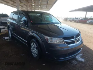 2014 Dodge Journey American Value with VIN 3C4PDCAB9ET258578, listed as a IAAI auction lot 42714595 with 217,647 mi miles and . Bid and sale history available at DreamBid. Image 1.