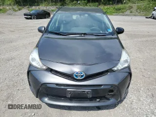 2016 Toyota Prius Two z VIN JTDZN3EUXGJ054531, wystawiony jako Copart lot #59105225 z przebiegiem Nie podano mil oraz Czysty tytuł • Clean title. Historia ofert i sprzedaży dostępna na DreamBid. Obrazek 5.
