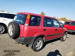 1999 Honda CR-V LX with VIN JHLRD2843XC014579, listed as a Copart auction lot 79394924 with 249,544 mi miles and Salvage Title. Bid and sale history available at carsss.com. Image 3.
