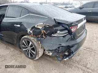 2021 Nissan Maxima SV with VIN 1N4AA6CV9MC513687, listed as a IAAI auction lot 41744440 with 67,386 mi miles and . Bid and sale history available at DreamBid. Image 6.