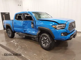 2021 Toyota Tacoma SR z VIN 3TMCZ5ANXMM376878, wystawiony jako IAAI lot #42177027 z przebiegiem 54 035 mil mil oraz . Historia ofert i sprzedaży dostępna na DreamBid. Obrazek 1.