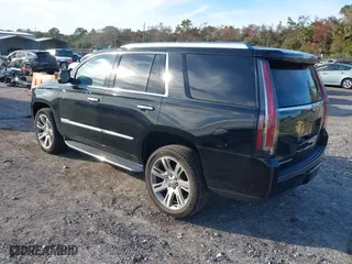 2018 Cadillac Escalade Luxury with VIN 1GYS3BKJ7JR291430, listed as a IAAI auction lot 41449233 with 128,281 mi miles. Bid and sale history available at carsss.com. Image 3.