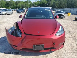 2024 Tesla Model Y Long Range z VIN 7SAYGAEEXRF071829, wystawiony jako Copart lot #56003215 z przebiegiem 29 446 mil mil oraz Szkoda całkowita • Salvage title. Historia ofert i sprzedaży dostępna na DreamBid. Obrazek 5.