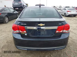 2014 Chevrolet Cruze LTZ z VIN 1G1PG5SB7E7335060, wystawiony jako IAAI lot #41710133 z przebiegiem 170 000 mil mil oraz . Historia ofert i sprzedaży dostępna na DreamBid. Obrazek 16.