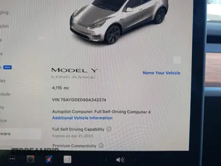 2025 Tesla Model Y Long Range with VIN 7SAYGDED9SA342374, listed as a IAAI auction lot 41663085 with 4,115 mi miles and . Bid and sale history available at DreamBid. Image 7.