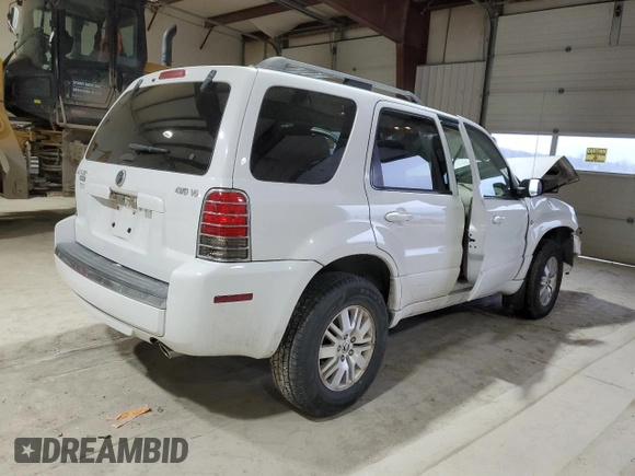 2005 Mercury Mariner Luxury z VIN 4M2CU57145DJ11612, wystawiony jako Copart lot #43980985 z przebiegiem 102 859 mil mil oraz Szkody całkowita. Historia ofert i sprzedaży dostępna na DreamBid. Obrazek 3.