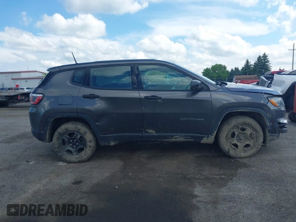 2018 Jeep Compass Sport z VIN 3C4NJCAB0JT267454, wystawiony jako IAAI lot #42266843 z przebiegiem 116 775 mil mil oraz . Historia ofert i sprzedaży dostępna na DreamBid. Obrazek 13.