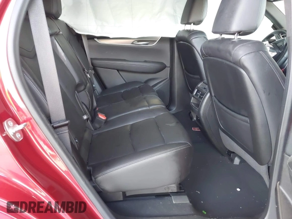 2024 Cadillac XT5 FWD Luxury with VIN 1GYKNAR42RZ738679, listed as a IAAI auction lot 42355530 with 14,660 mi miles and . Bid and sale history available at DreamBid. Image 8.