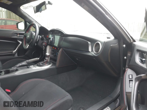 2014 Scion FR-S with VIN JF1ZNAA12E8702261, listed as a IAAI auction lot 41971045 with 124,341 mi miles and . Bid and sale history available at DreamBid. Image 5.