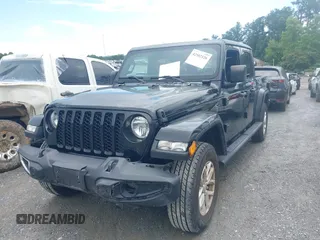 2023 Jeep Gladiator Sport S z VIN 1C6HJTAG3PL521954, wystawiony jako IAAI lot #42502126 z przebiegiem 49 606 mil mil oraz . Historia ofert i sprzedaży dostępna na DreamBid. Obrazek 17.