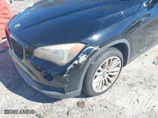2013 BMW X1 28i with VIN WBAVM1C51DVW41977, listed as a IAAI auction lot 41607741 with 158,258 mi miles. Bid and sale history available at carsss.com. Image 6.