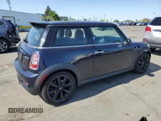 2013 MINI Hardtop S with VIN WMWSV3C5XDT396202, listed as a Copart auction lot 52175055 with 50,701 mi miles and Salvage Title. Bid and sale history available at DreamBid. Image 3.
