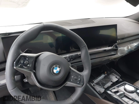 2024 BMW 5 Series 530i xDrive with VIN WBA53FJ03RCS25603, listed as a IAAI auction lot 42141231 with Not provided miles and . Bid and sale history available at DreamBid. Image 7.