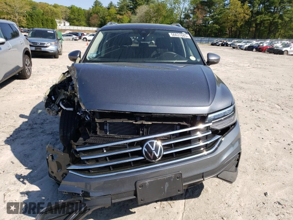 2023 Volkswagen Tiguan SE with VIN 3VVMB7AX6PM083524, listed as a Copart auction lot 56631685 with 18,705 mi miles and Salvage title. Bid and sale history available at DreamBid. Image 5.