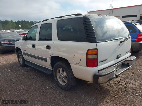 2003 Chevrolet Tahoe LT with VIN 1GNEC13Z13J230763, listed as a IAAI auction lot 42028002 with 201,448 mi miles. Bid and sale history available at carsss.com. Image 3.