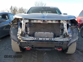 2023 GMC Canyon 4WD AT4 with VIN 1GTP6DEK5P1170230, listed as a Copart auction lot 42701935 with 26,704 mi miles and Salvage Title. Bid and sale history available at carsss.com. Image 5.