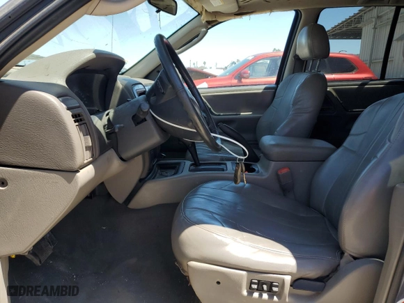 2004 Jeep Grand Cherokee Laredo with VIN 1J4GX48N54C371073, listed as a Copart auction lot 52202855 with 212,368 mi miles and Salvage Title. Bid and sale history available at carsss.com. Image 7.