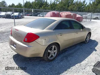 2005 Pontiac G6 with VIN 1G2ZG528754143549, listed as a IAAI auction lot 41726420 with 243,882 mi miles. Bid and sale history available at carsss.com. Image 4.