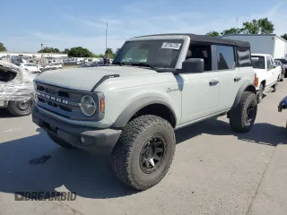 2021 Ford Bronco с VIN 1FMDE5BH0MLA73646, выставлен на аукционе Copart как лот 52764735 с пробегом 60 607 миль миль и Списание • Salvage title. История ставок и продаж доступна на DreamBid. Изображение 1.