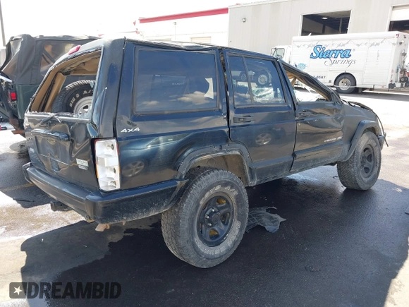 2000 Jeep Cherokee Classic with VIN 1J4FF58S5YL134745, listed as a IAAI auction lot 40352984 with 1 mi miles. Bid and sale history available at carsss.com. Image 4.