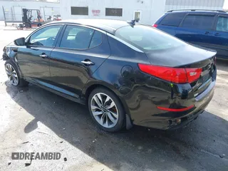 2015 Kia Optima SX Turbo with VIN 5XXGR4A67FG407786, listed as a IAAI auction lot 41606324 with 194,837 mi miles. Bid and sale history available at carsss.com. Image 3.