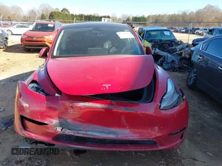 2023 Tesla Model Y Long Range with VIN 7SAYGDEE8PF709459, listed as a IAAI auction lot 41334108 with 51,544 mi miles. Bid and sale history available at carsss.com. Image 11.