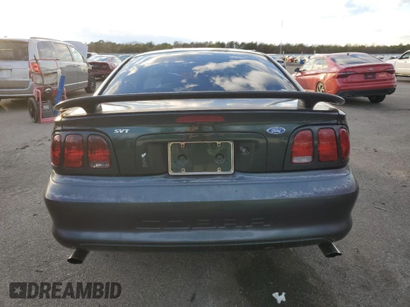 1996 Ford Mustang Cobra with VIN 1FALP47V8TF171331, listed as a Copart auction lot 83771084 with 0 mi miles and Salvage Title. Bid and sale history available at carsss.com. Image 6.