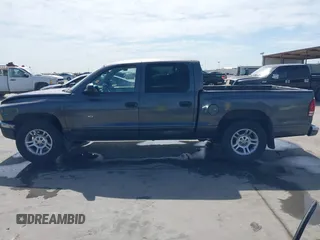 2001 Dodge Dakota z VIN 1B7HL2AX51S333575, wystawiony jako IAAI lot #41782582 z przebiegiem 291 640 mil mil oraz . Historia ofert i sprzedaży dostępna na DreamBid. Obrazek 14.