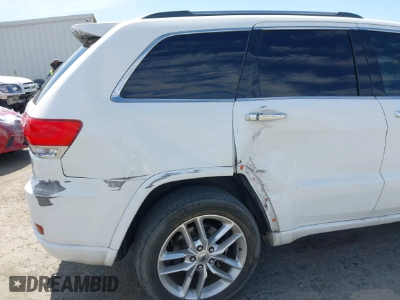 2015 Jeep Grand Cherokee Overland with VIN 1C4RJFCG3FC230185, listed as a IAAI auction lot 42494650 with 123,128 mi miles and . Bid and sale history available at DreamBid. Image 6.