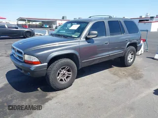 2001 Dodge Durango z VIN 1B4HS28N81F643555, wystawiony jako IAAI lot #42725611 z przebiegiem 271 428 mil mil oraz . Historia ofert i sprzedaży dostępna na DreamBid. Obrazek 2.