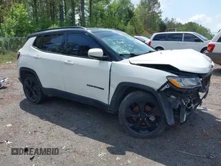 2021 Jeep Compass Altitude with VIN 3C4NJCBB8MT531586, listed as a IAAI auction lot 41941336 with 61,476 mi miles. Bid and sale history available at carsss.com. Image 1.
