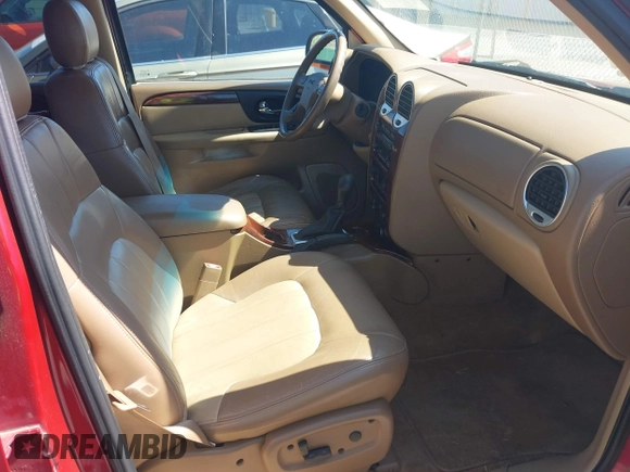 2002 GMC Envoy SLT with VIN 1GKDS13S922205147, listed as a IAAI auction lot 42041118 with 127,400 mi miles. Bid and sale history available at carsss.com. Image 5.